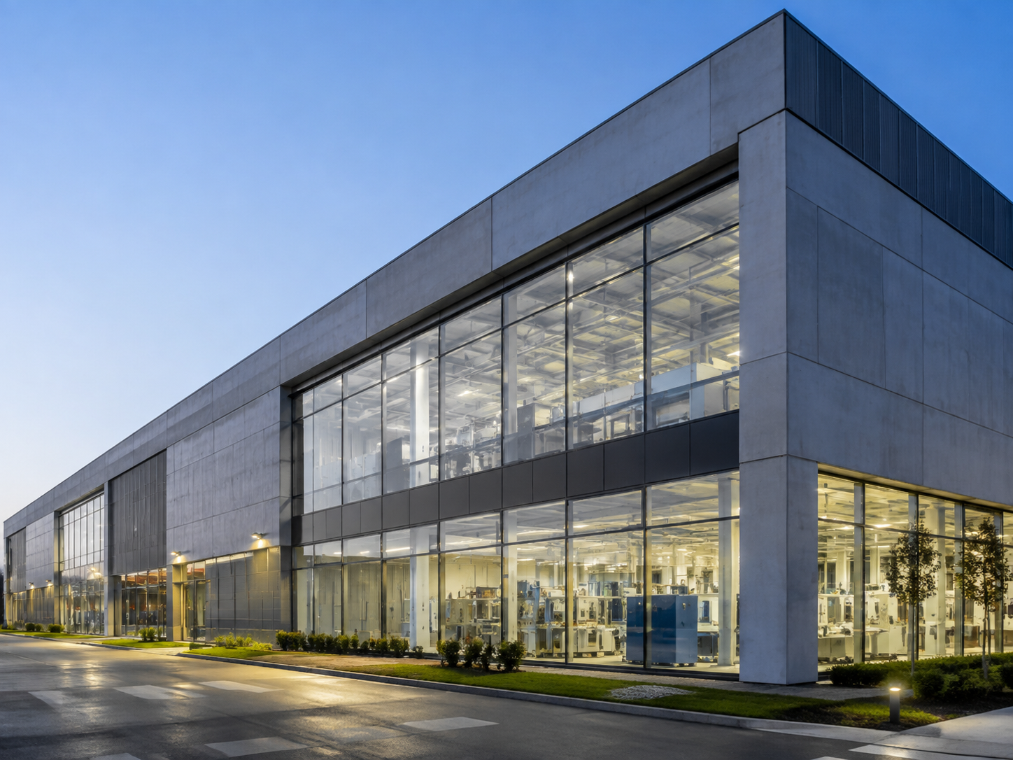 Exterior and production-floor view of an industrial machinery factory